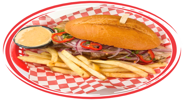 Sándwich de chicharrón served in a traditional Peruvian style